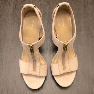 Michael Kors cream colored platform sandals with embossed leather.